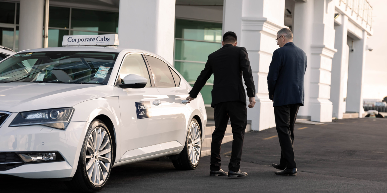 Corporate Cabs picking up a customer