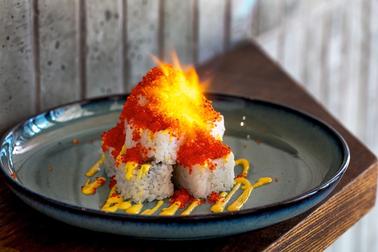 Volcano Sushi - Azabu Sushi on a plate with flame