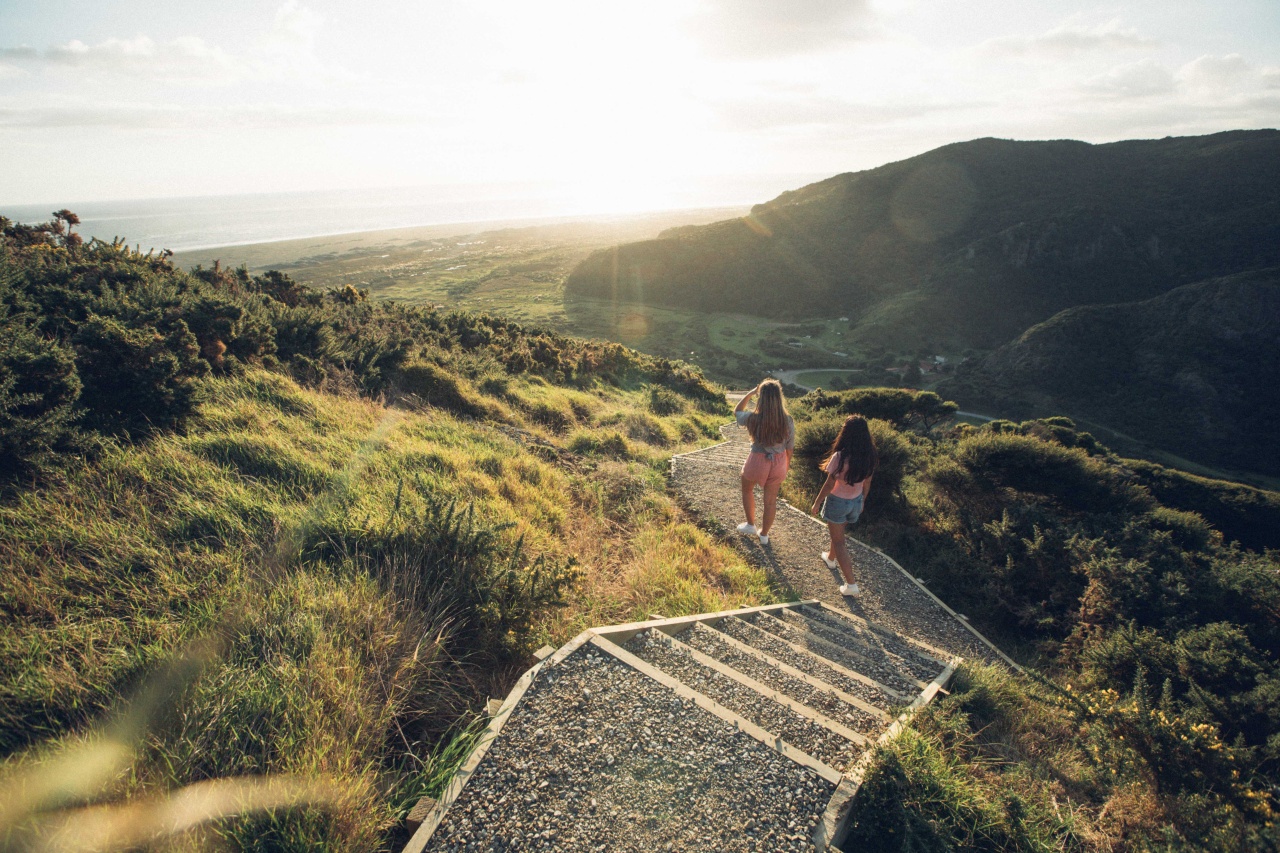Two girls walking on a track