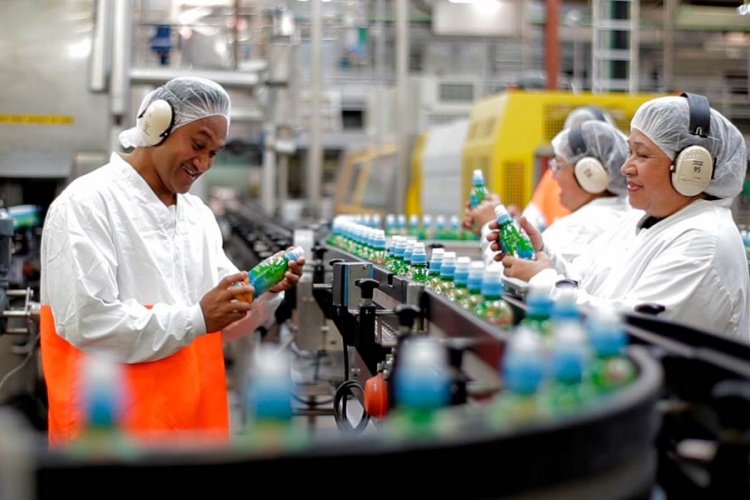 Workers on production line in a factory