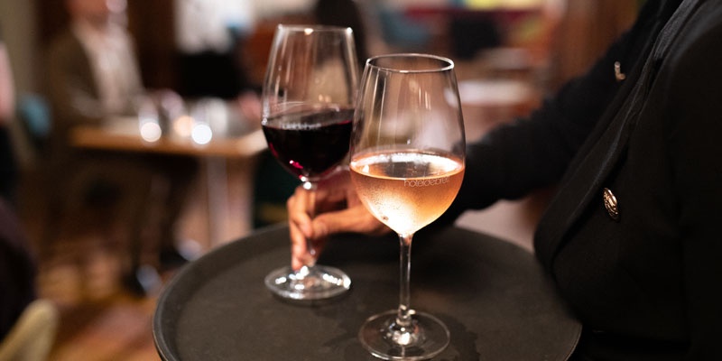 Wine glasses on a tray - Hotel Debrett